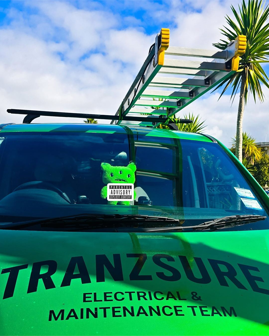 The Tranzsure work van with a ladder loaded on the roof rack, ready for a job