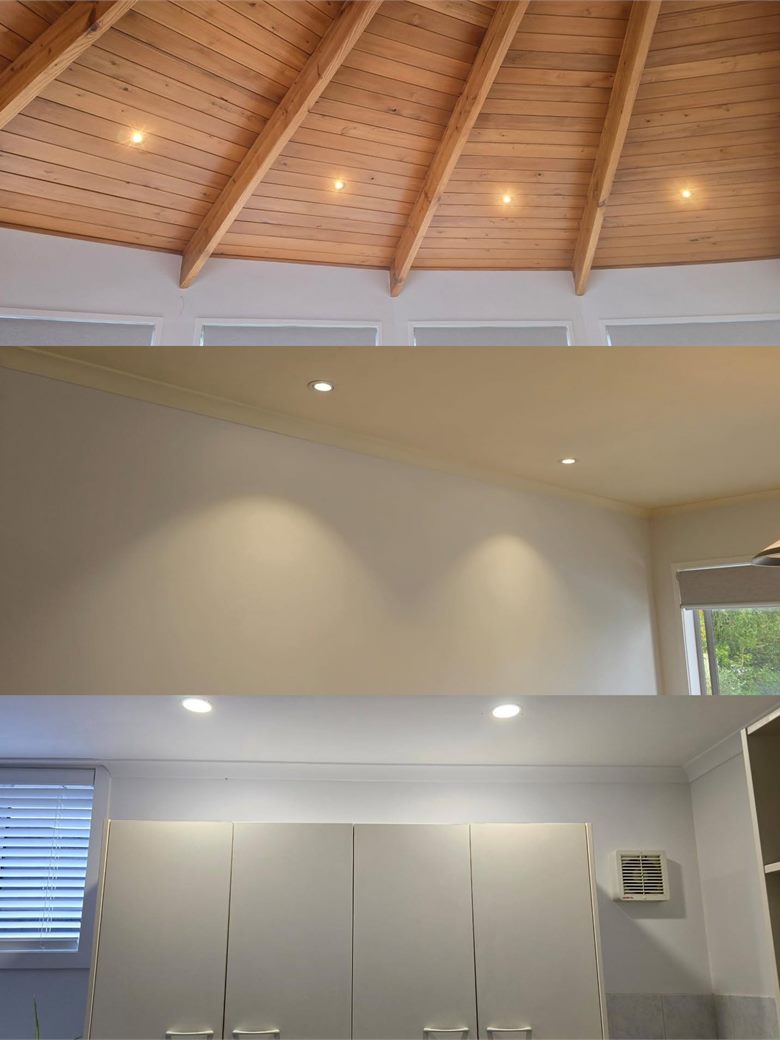 Two photos of a downlight job: recessed LEDs set into a vaulted timber ceiling above, and the finished room below with the new lights on